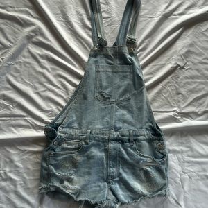 Super cute distressed overall shorts